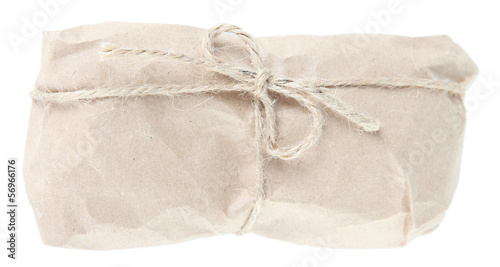 Telephone wrapped in brown kraft paper, isolated on white