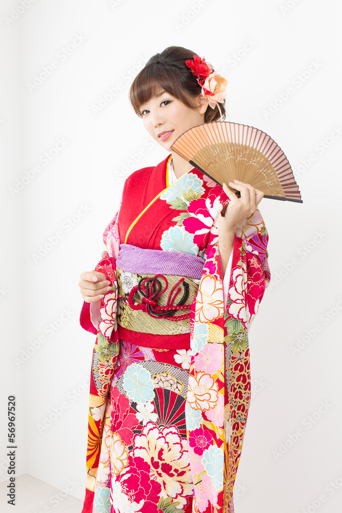 Beautiful asian kimono woman on white background Beautiful asian kimono woman on white background