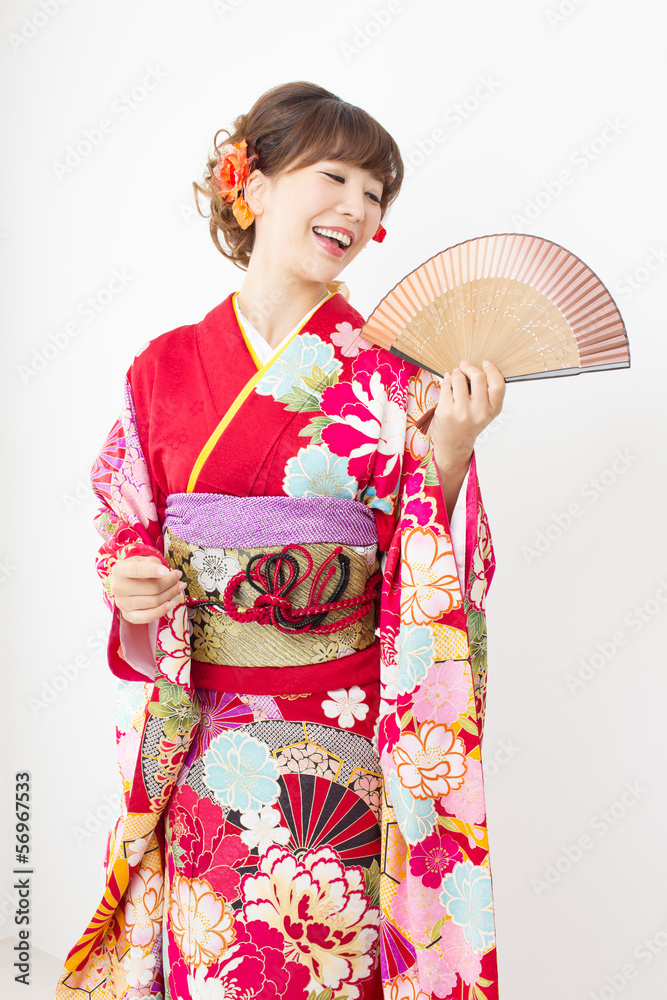 Beautiful asian kimono woman on white background Beautiful asian kimono woman on white background