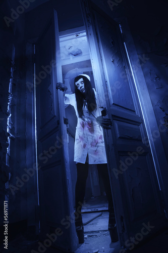 фотографія Horror movie. Crazy dead nurse