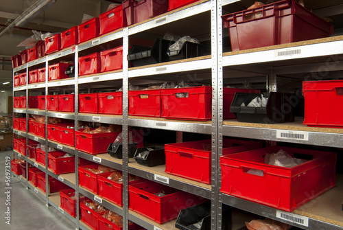 Schilderij op canvas Storage room with boxes and shelves