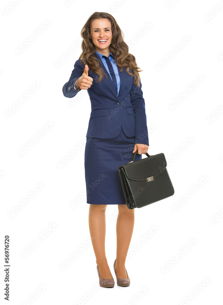 Full length portrait of smiling business woman with briefcase Full length portrait of smiling business woman with briefcase