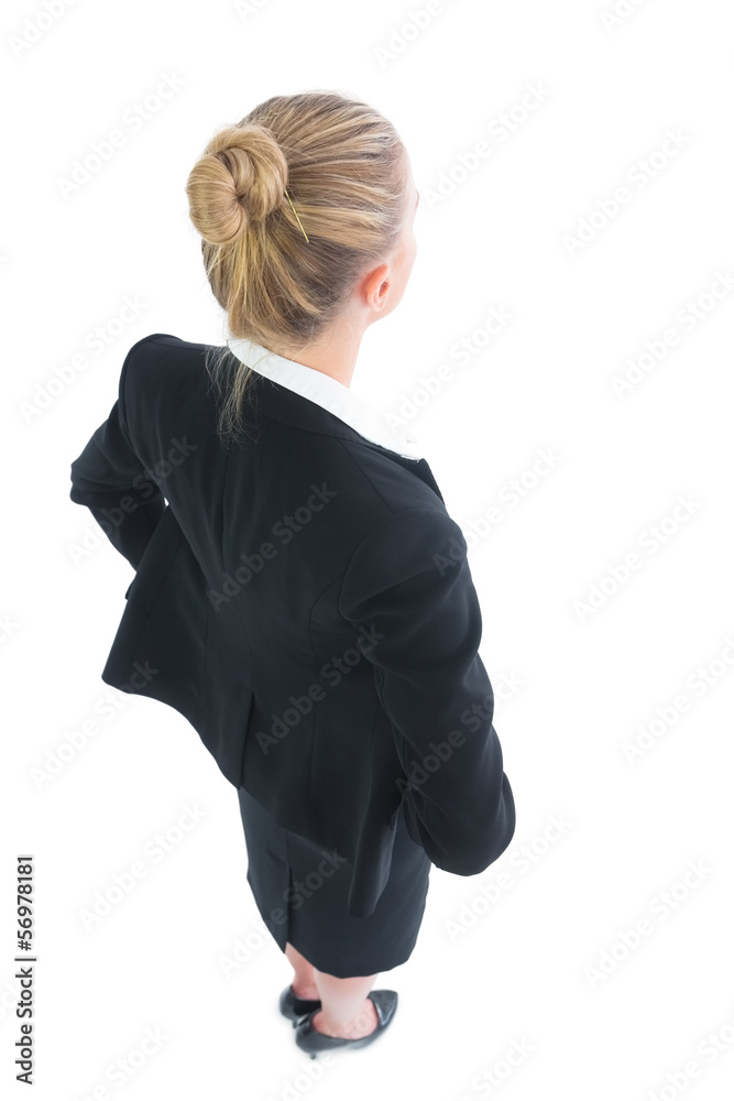 High angle rear view of young businesswoman posing High angle rear view of young businesswoman posing