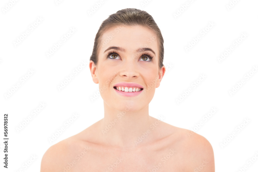Smiling woman looking up Smiling woman looking up