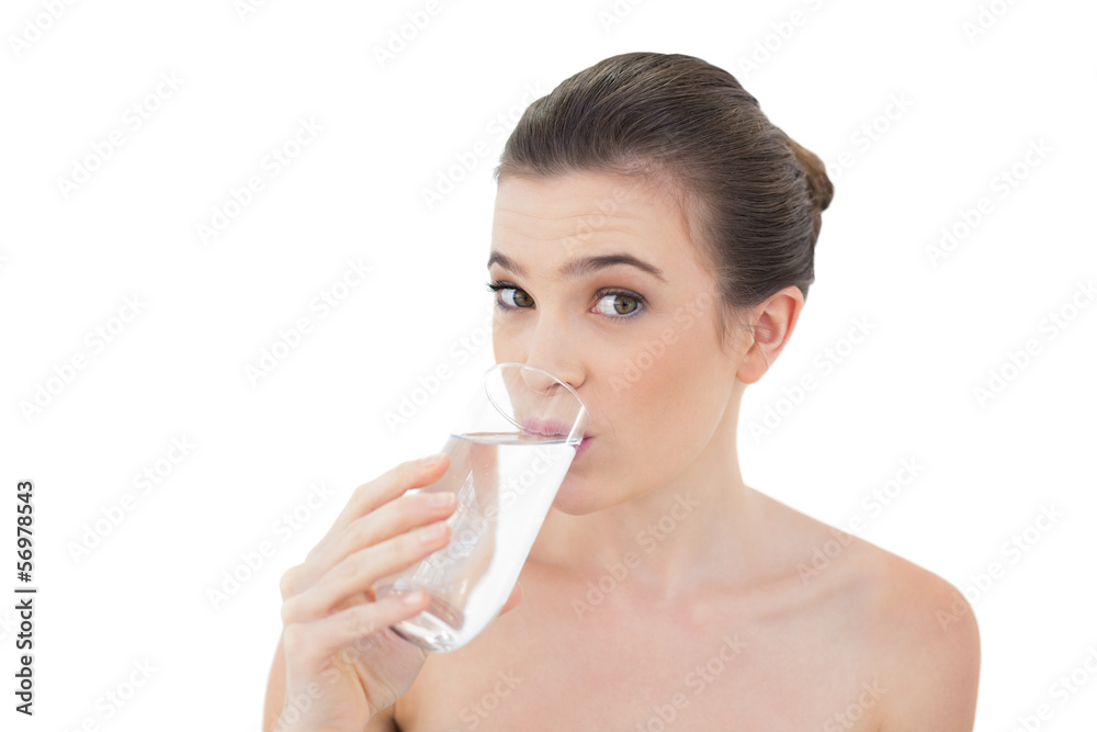 Cute natural brown haired model drinking water Cute natural brown haired model drinking water