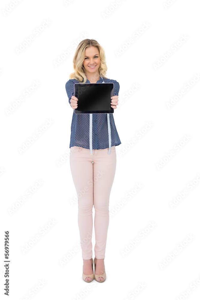 Happy pretty fashion designer showing tablet Happy pretty fashion designer showing tablet