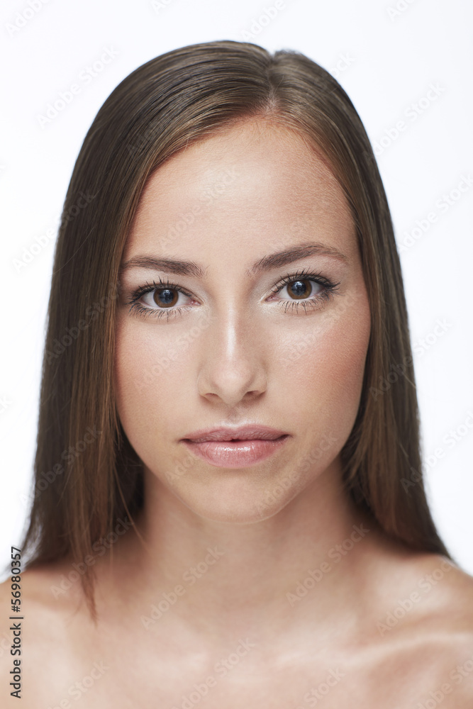 Portrait of young woman against white background Portrait of young woman against white background