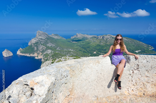 Happy teenage girl on the hills top on Majorca island