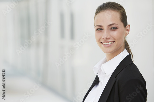 Portrait of young businesswoman smiling