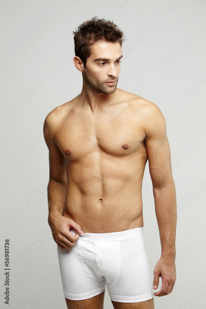 Fototapeta premium Mid adult man in underpants, studio shot