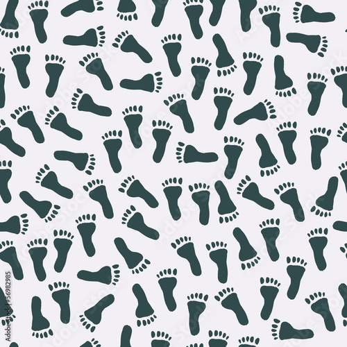 Seamless pattern with black footprints