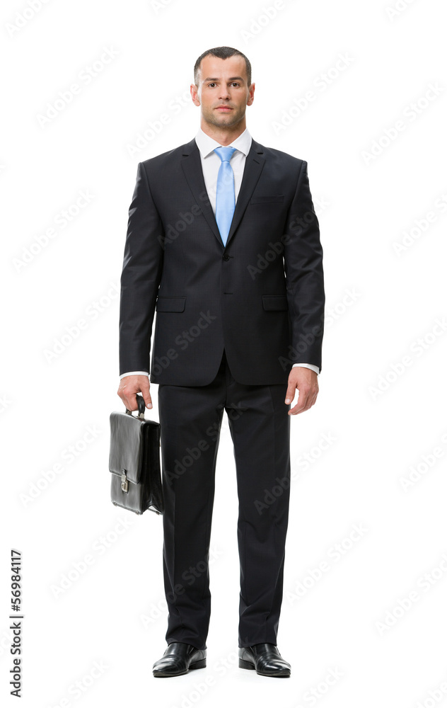 Full-length portrait of business man with case Full-length portrait of business man with case