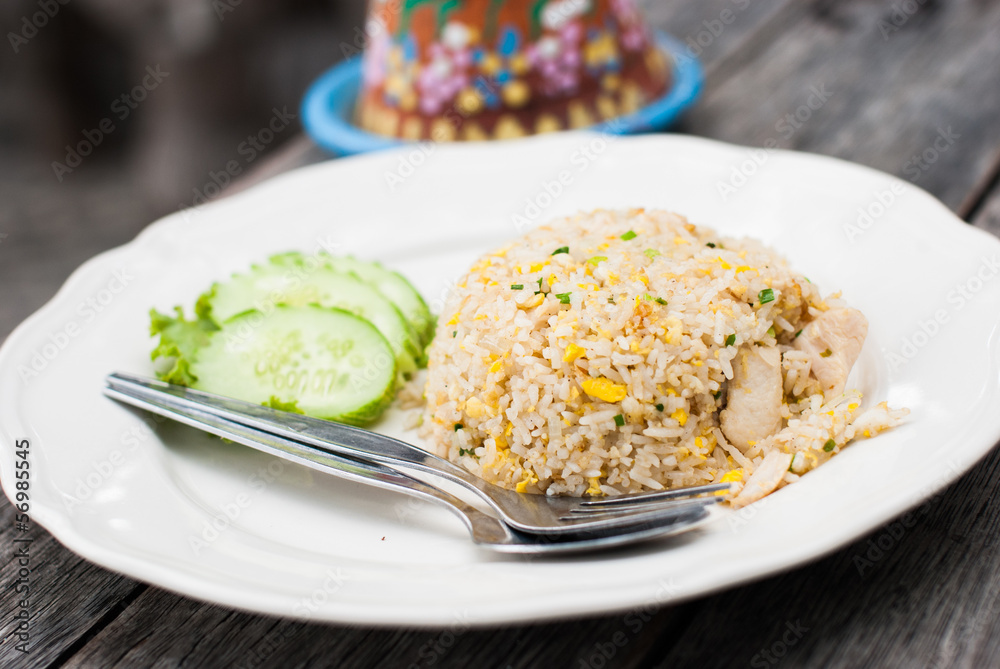 Fried rice with chicken in white dish Fried rice with chicken in white dish