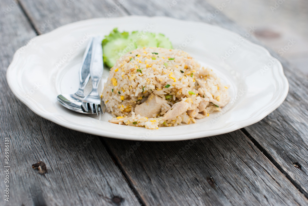 Fried rice with chicken in white dish Fried rice with chicken in white dish