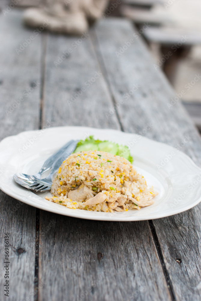 Fried rice with chicken in white dish Fried rice with chicken in white dish