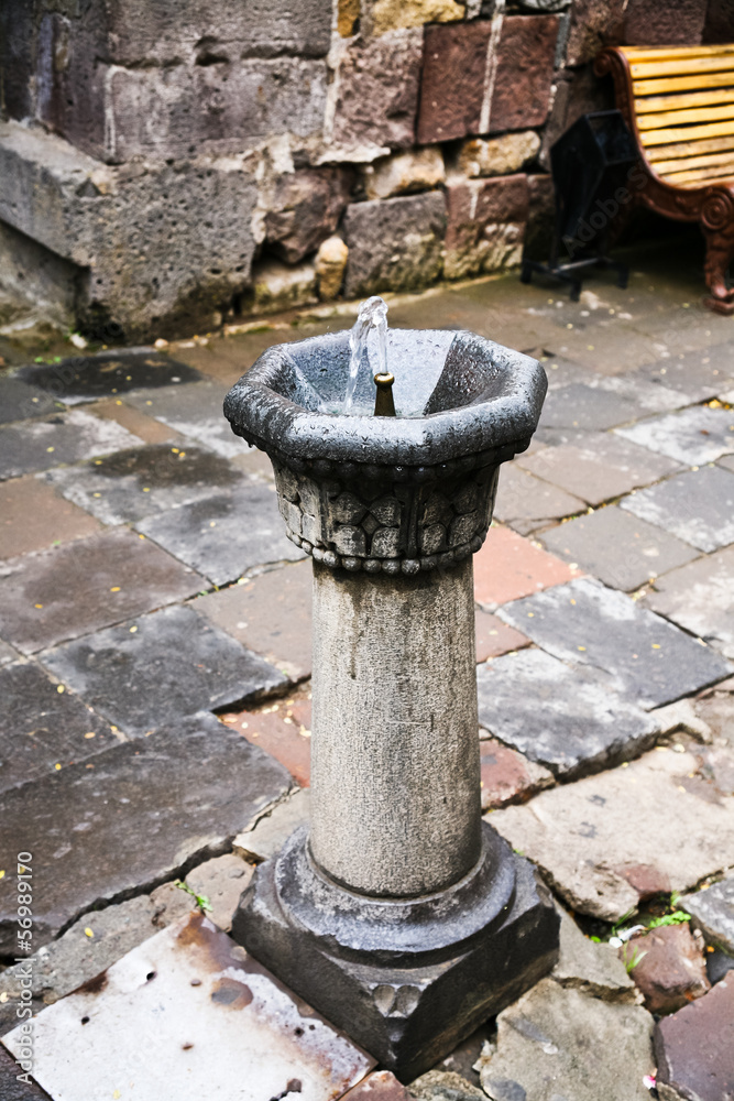 drinking fountain in medieval monastery in Armenia drinking fountain in medieval monastery in Armenia
