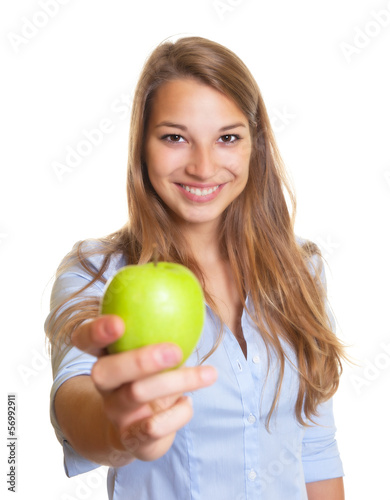 Beautiful woman offers an apple