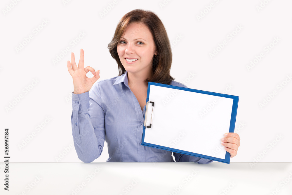 Business woman is holding a blank clipboard Business woman is holding a blank clipboard