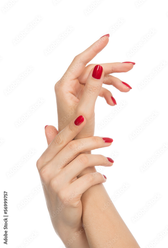 Woman hands with manicured red nails Woman hands with manicured red nails
