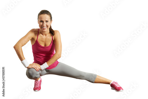 sportswoman doing stretching exersices photo