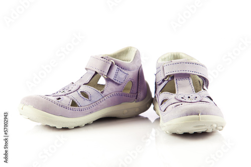 purple sandals for kids. children's shoes isolated on a white ba