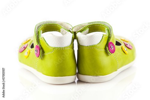 Green baby shoes. children's shoes isolated on a white backgrou