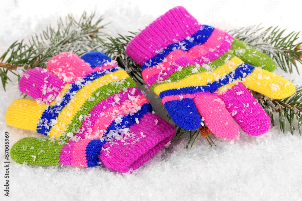 Children's mittens in snow
