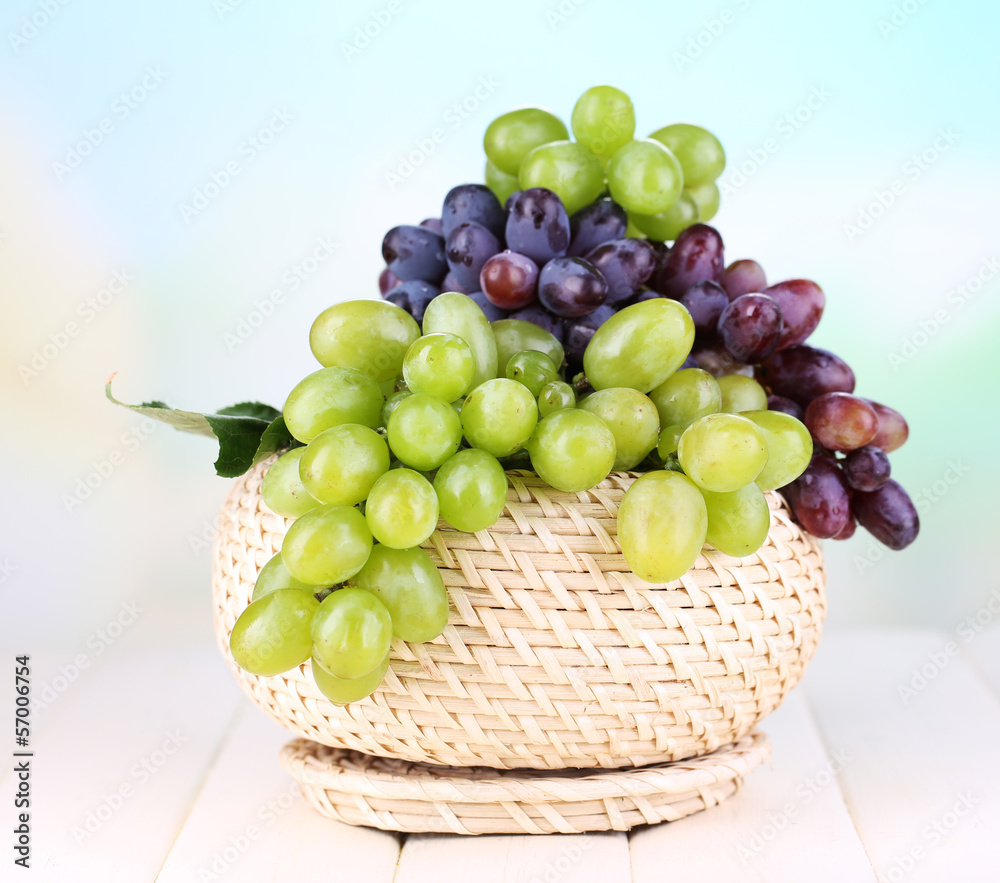Ripe green and purple grapes in basket Ripe green and purple grapes in basket