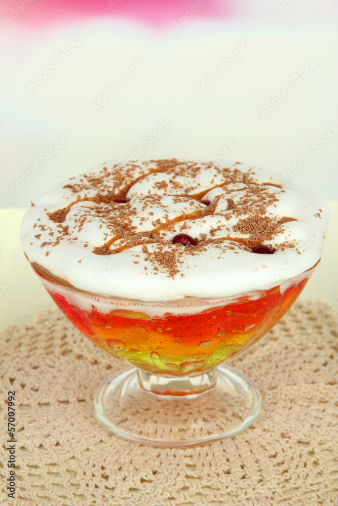 Tasty jelly in bowl on table on light background Tasty jelly in bowl on table on light background