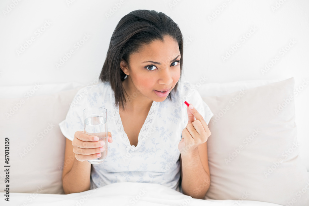 Pretty young dark haired model taking medication Pretty young dark haired model taking medication
