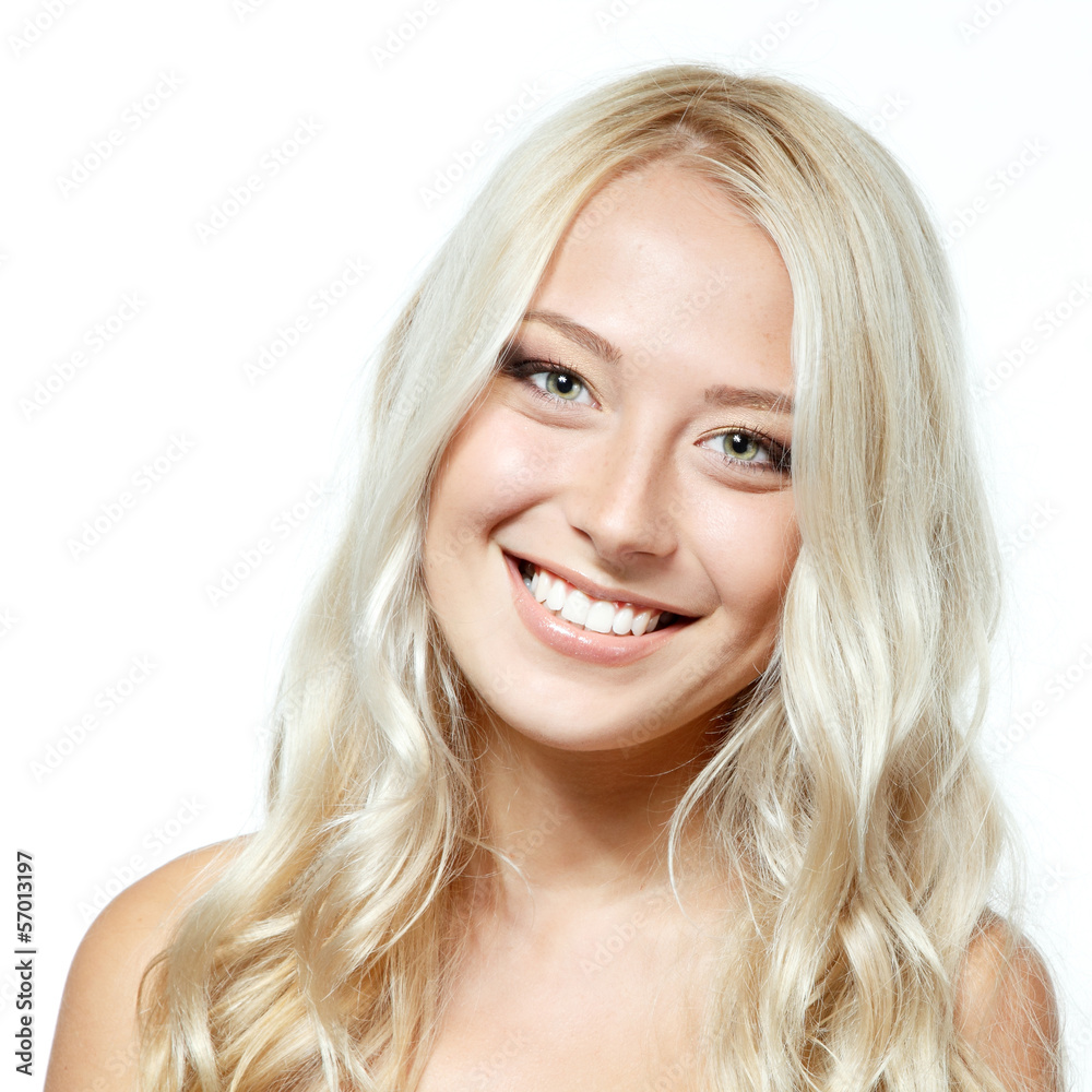 Beauty portrait of young smiling girl with blond hair. Isolated Beauty portrait of young smiling girl with blond hair. Isolated