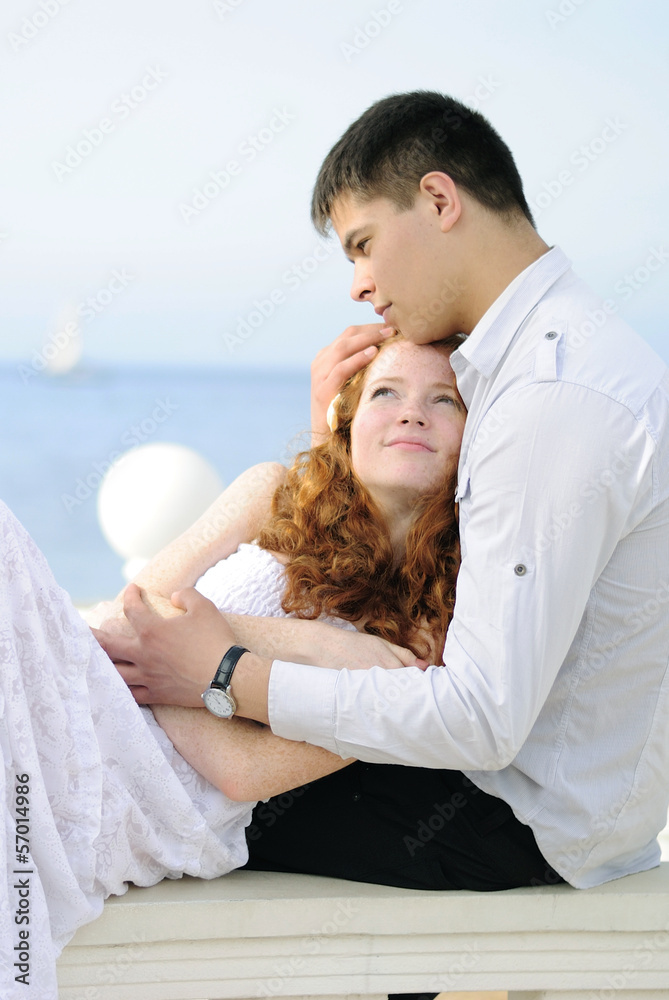 beautiful young couple in love near the sea beautiful young couple in love near the sea