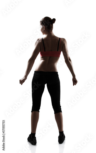 back view of sport young woman, silhouette studio shot over whit