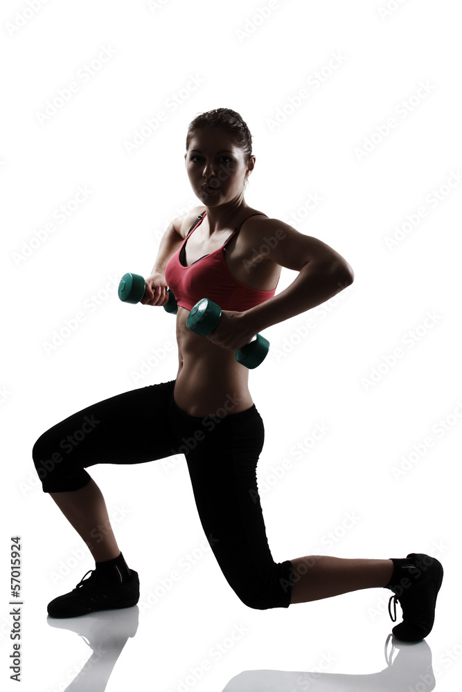 sport young athletic woman doing squatting with dumbbells, silho