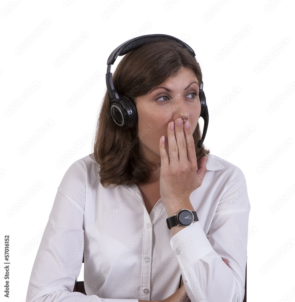 Tired call centre executive yawning at work Tired call centre executive yawning at work