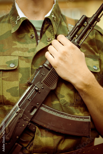 Soldier with AK-47 assault rifle