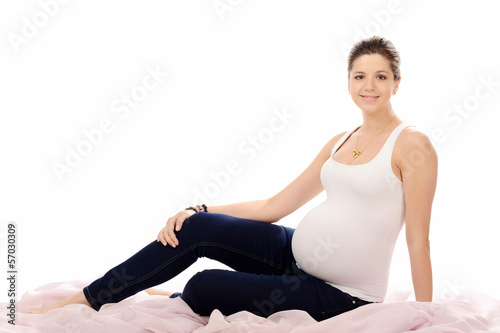 Pregnant woman over white background