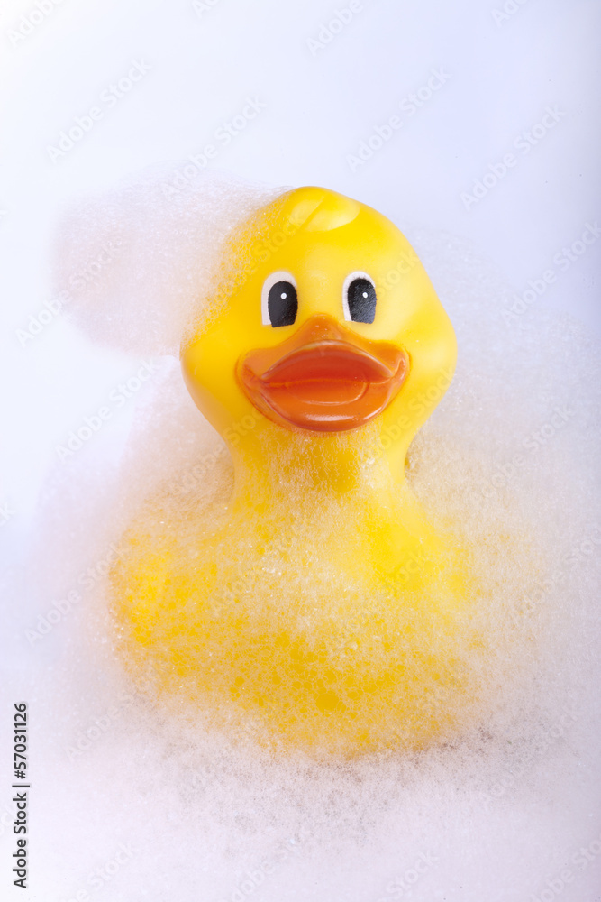 Bath time rubber duck in foam bath Bath time rubber duck in foam bath