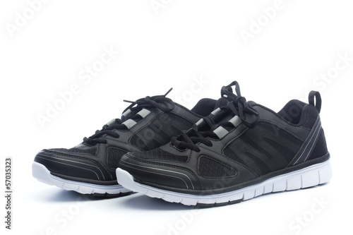 Pair of black sport shoes, sneakers