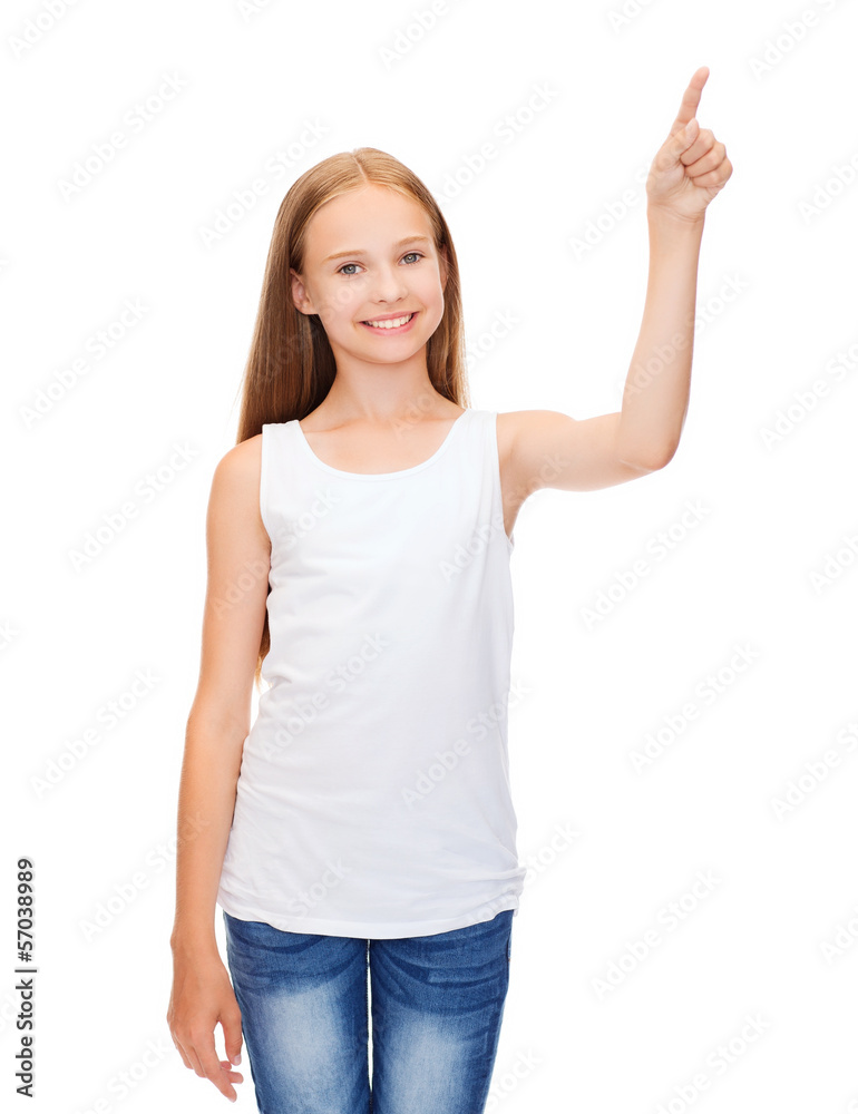 girl in blank white shirt pointing to something girl in blank white shirt pointing to something