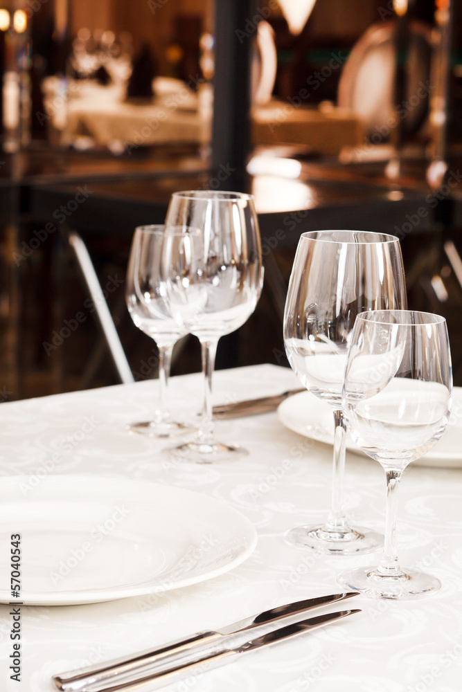 Tables set for meal Tables set for meal