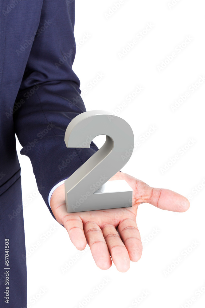 Business man holding a 3d number in hand palm Business man holding a 3d number in hand palm