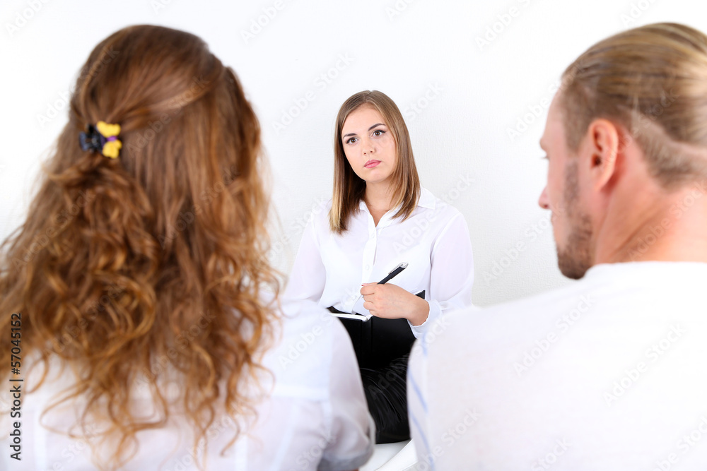 Young couple with problem on reception for family psychologist Young couple with problem on reception for family psychologist