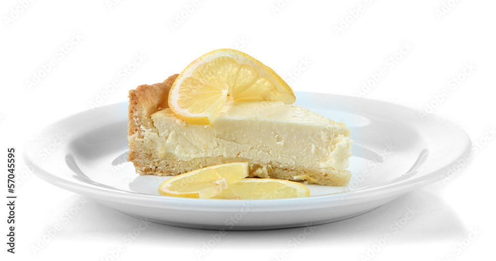 Slice of lemon cheesecake on plate, isolated on white Slice of lemon cheesecake on plate, isolated on white
