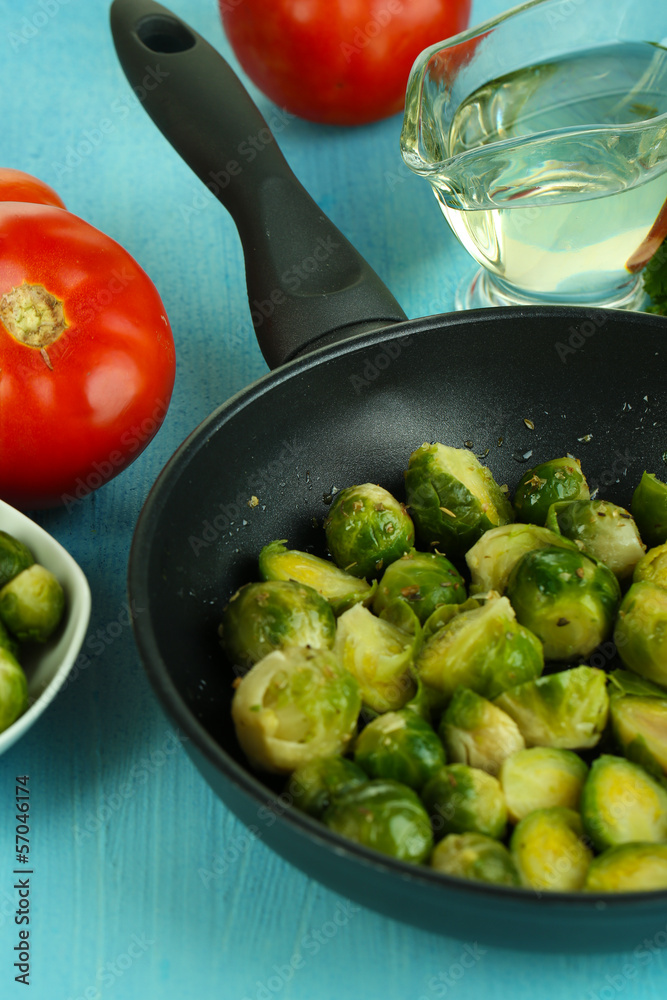 Fresh brussels sprouts in pan with vegetables and spices Fresh brussels sprouts in pan with vegetables and spices