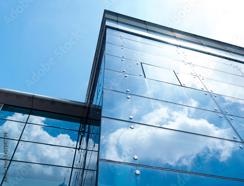 Modern business building with sky reflection