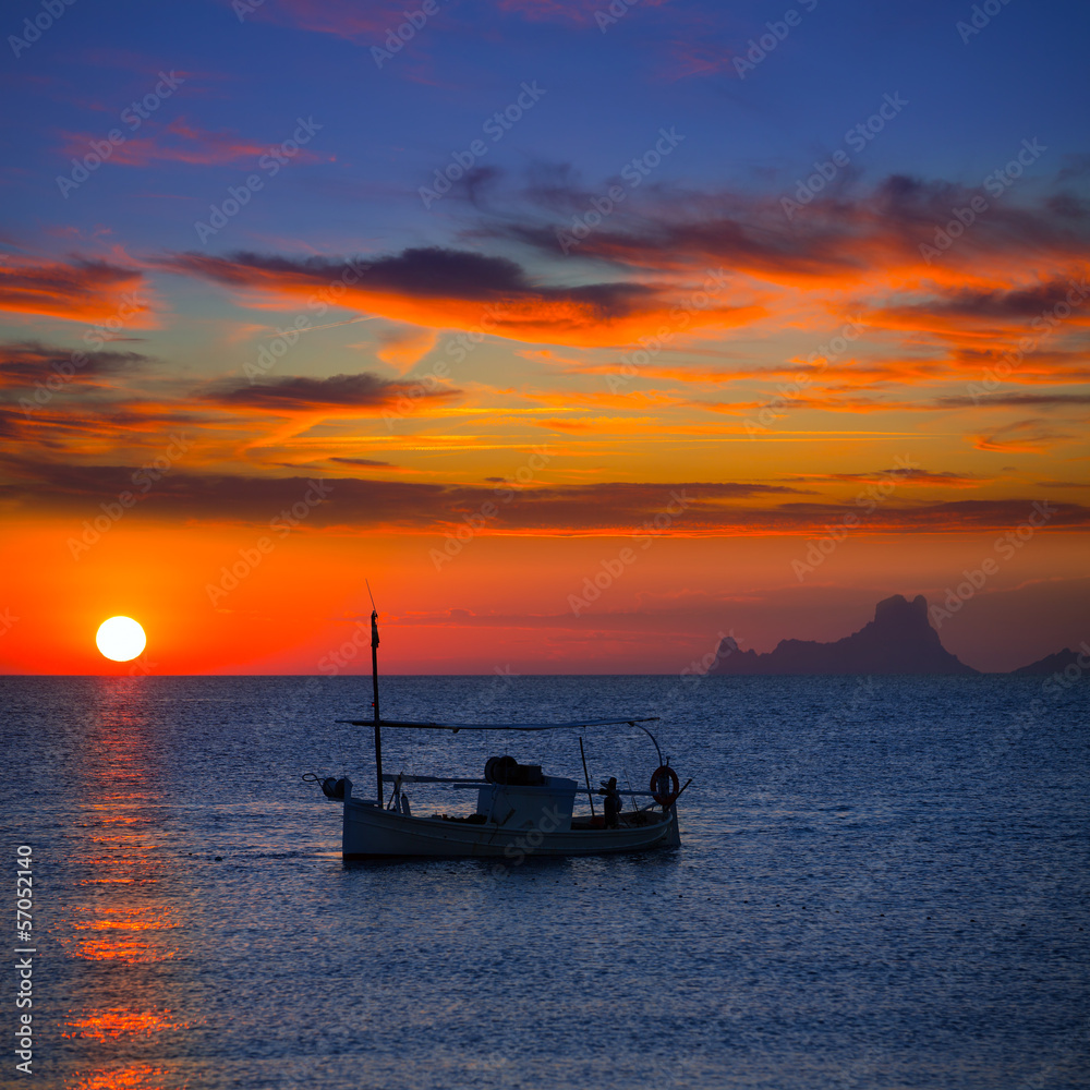 Ibiza sunset Es Vedra view and fisherboat formentera