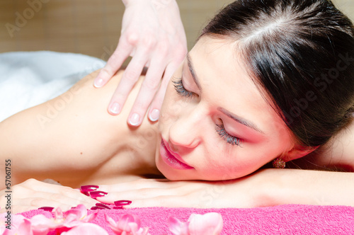 Beautiful woman relaxing during massage