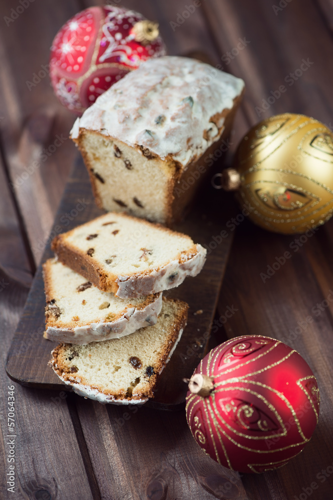 Sliced christmas fruit-cake, vertical shot Sliced christmas fruit-cake, vertical shot