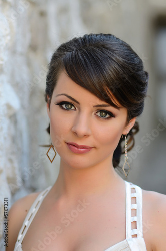 Portrait of a beautiful girl in white. Gentle and elegant style.